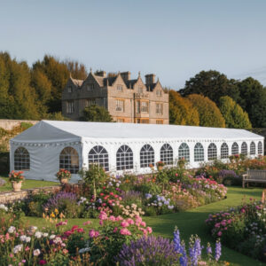 6m x 28m deluxe marquee in white with fire retardant pvc covers and galvanised steel frame