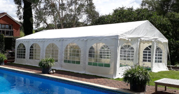 6m x 10m Commercial white PVC marquee with ground bars and steel framework