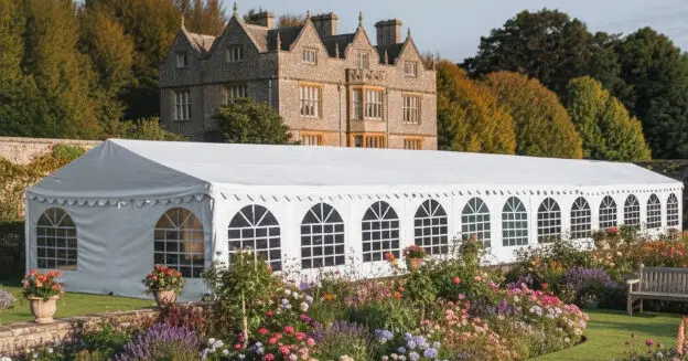 6m x 28m deluxe marquee in white with fire retardant pvc covers and galvanised steel frame