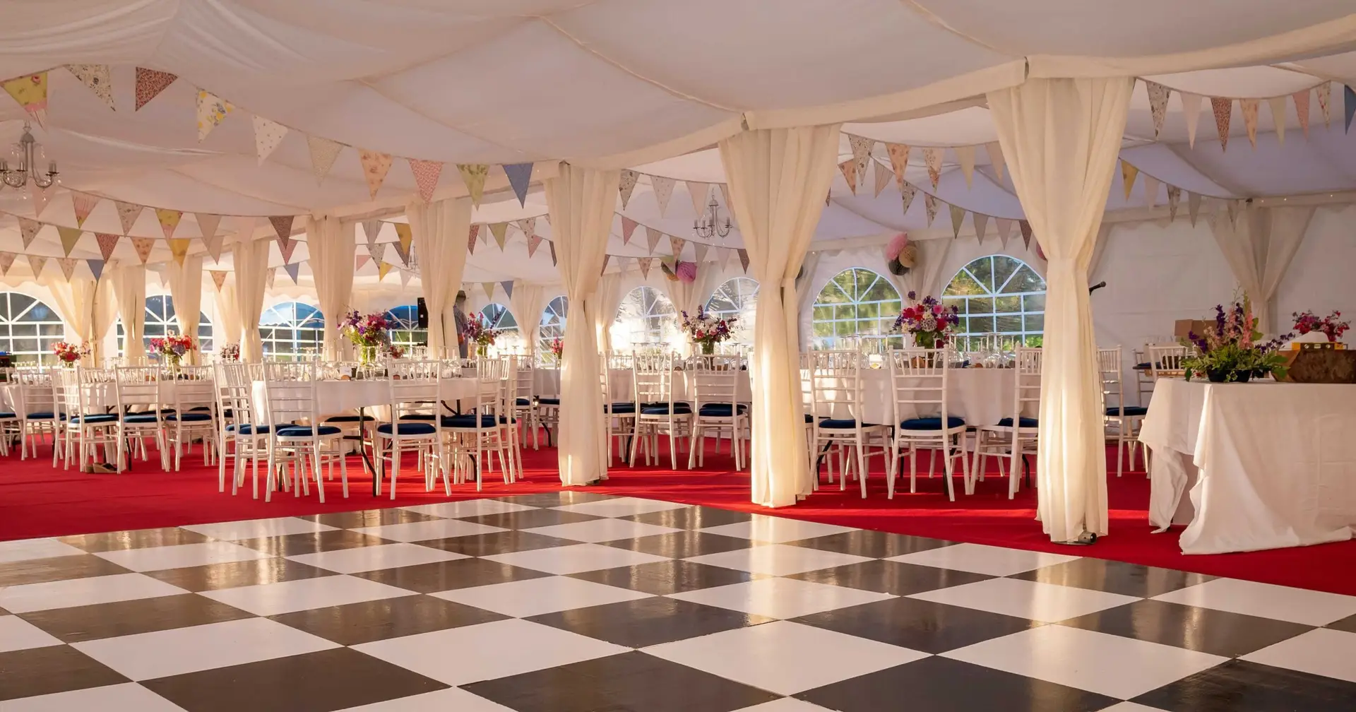 Marquee with full interior roof linings, curtain linings and swags
