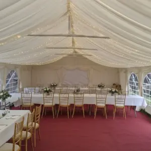 6m wide commercial marquee with flooring, lighting, pleated linings and furniture for a start up hire business